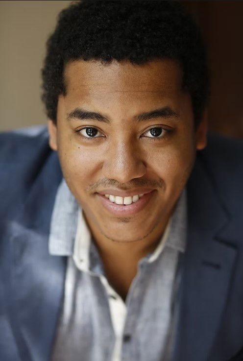 Anthony Vaughn Merchant backdrop