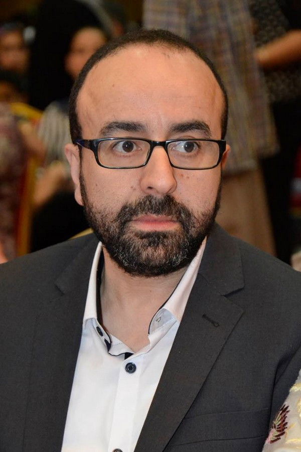 Mohamed Chrif Tribak backdrop