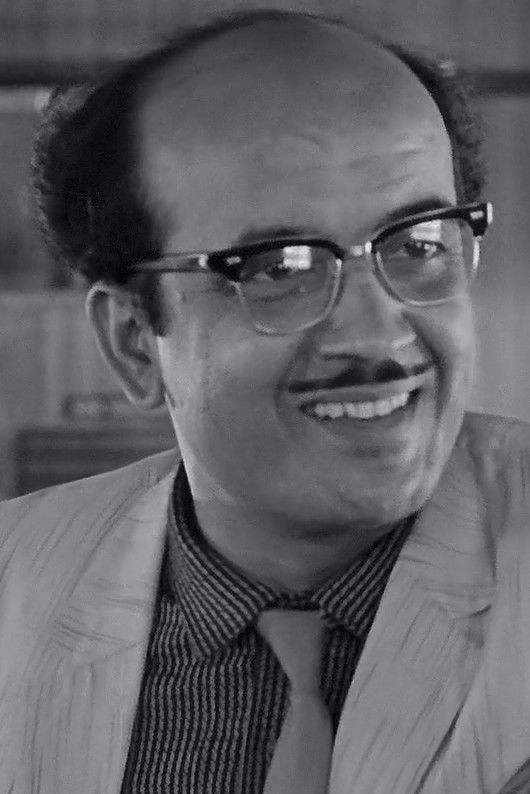 Kamu Mukherjee backdrop