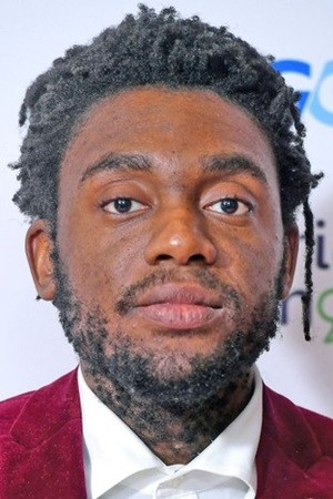 Mdhamiri á Nkemi backdrop