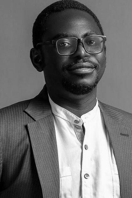 Niyi Akinmolayan backdrop