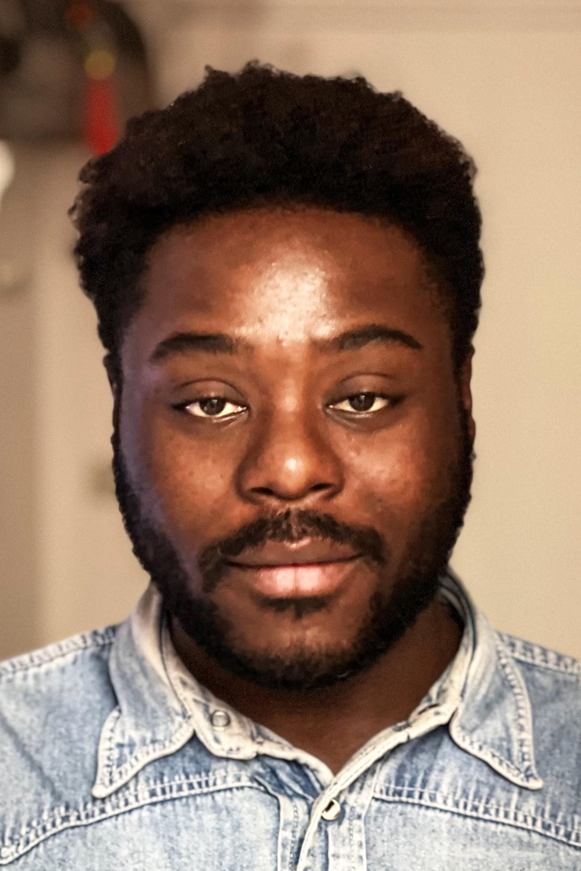 Régis Marvin Merveille N'Kissi Moggzi backdrop