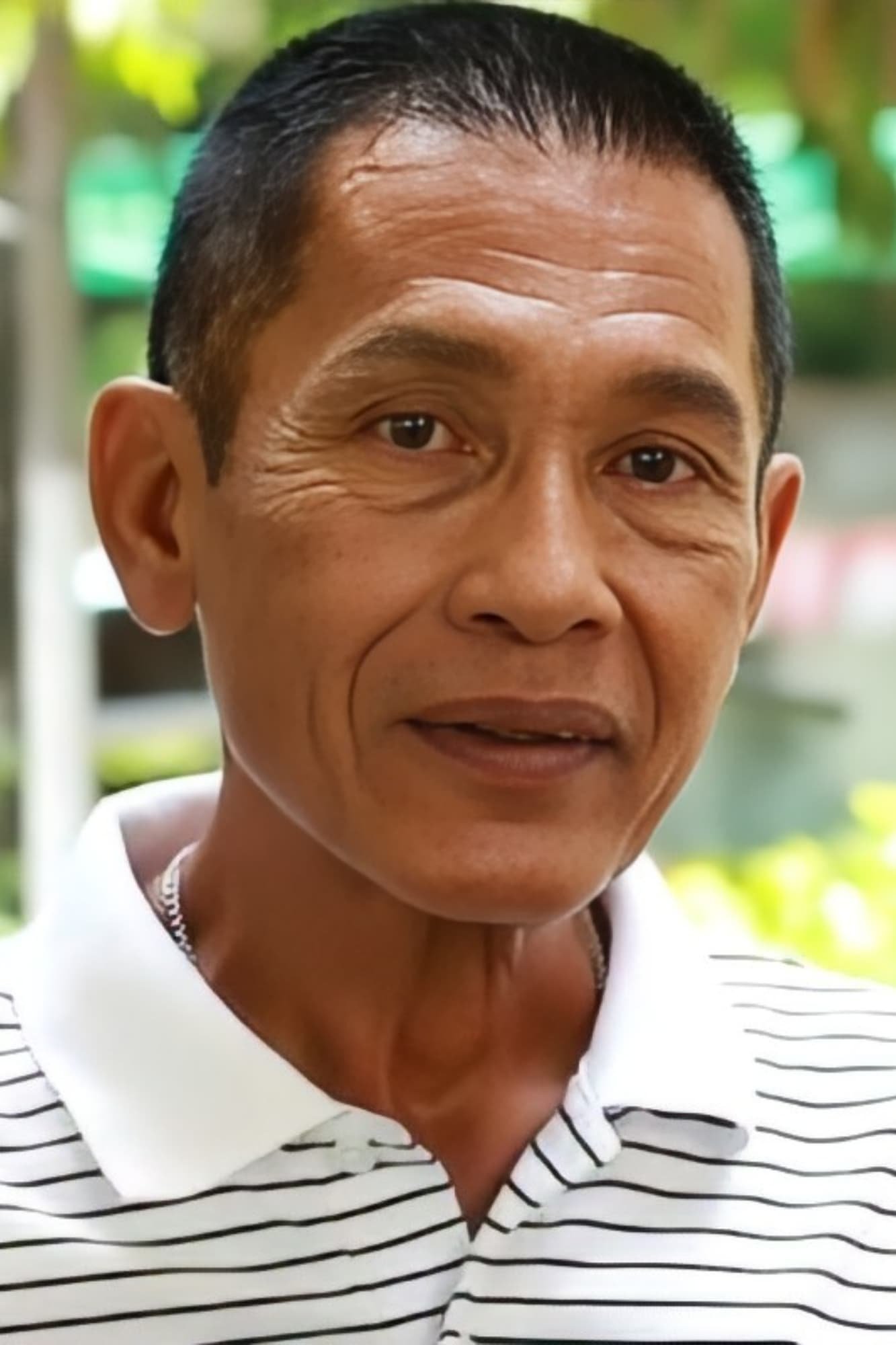 Porjed Kaenpetch backdrop