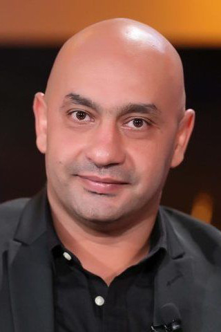 Islam Khairy backdrop