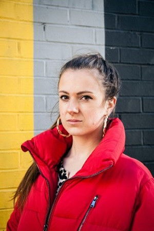 Daisy-May Hudson backdrop