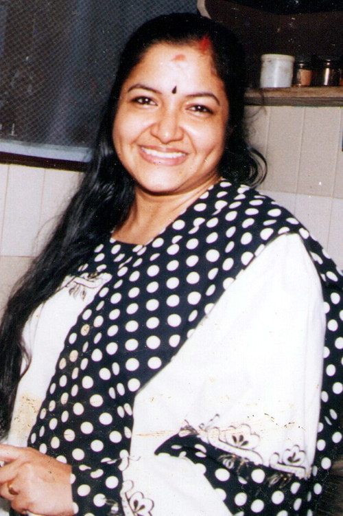 K. S. Chithra backdrop