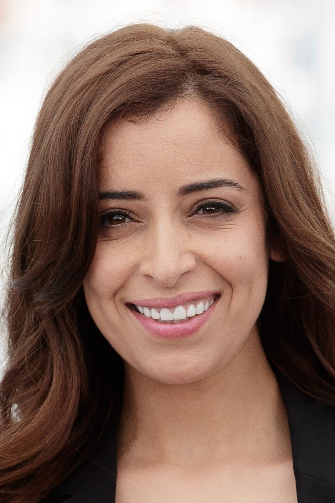 Nisrin Erradi backdrop