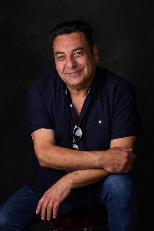 Norman Hassan backdrop