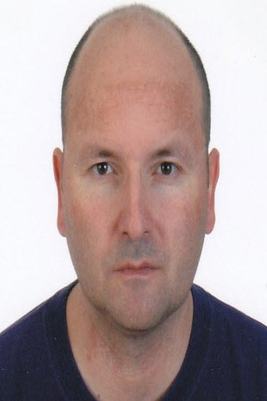 Athanassios Christos Macias backdrop