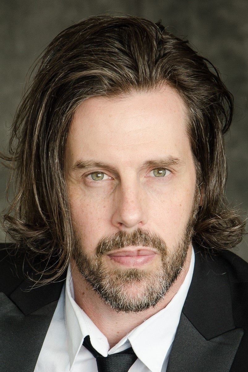 Justin Michael Carriere backdrop