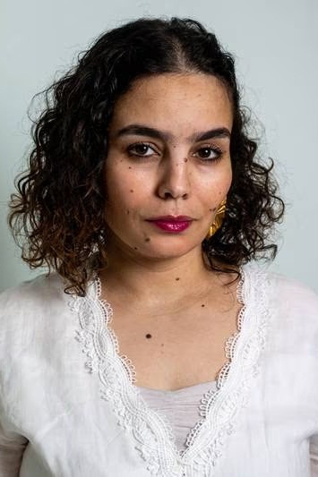 Asmae El Moudir backdrop