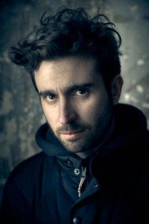 Hasan Can Dağlı backdrop