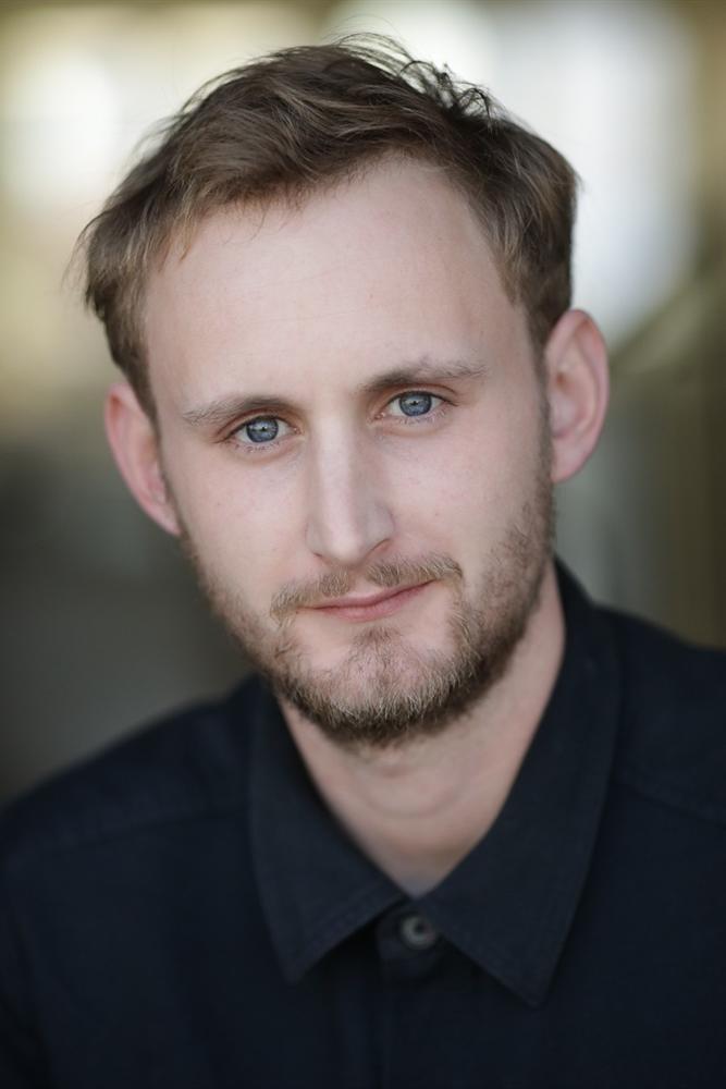 Victor Assié backdrop