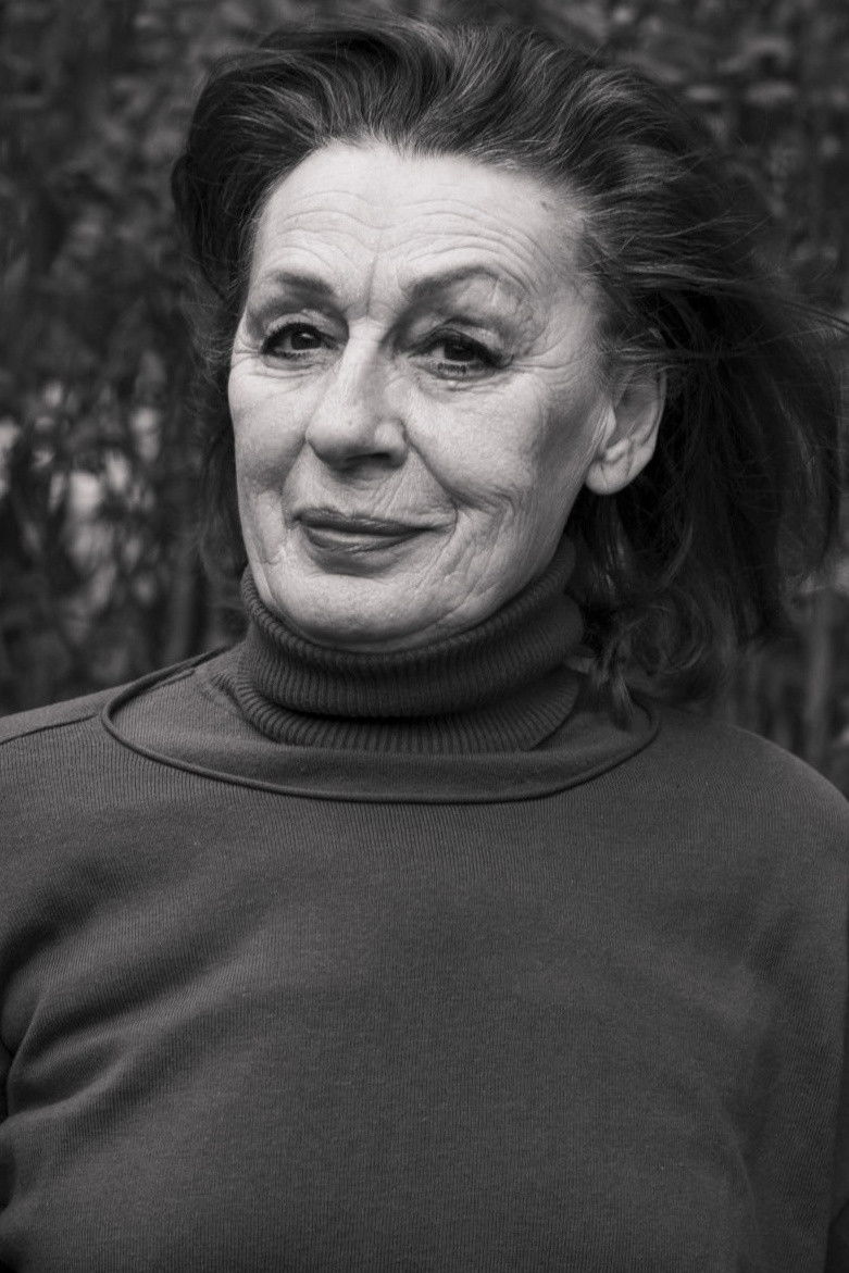 Kumrije Hoxha → Kumrije Hoxha backdrop