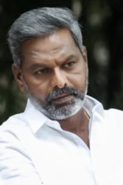 N. P. K. S. Logu backdrop