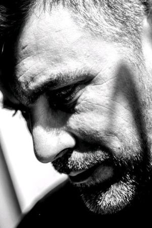 Néstor F. Dennis backdrop