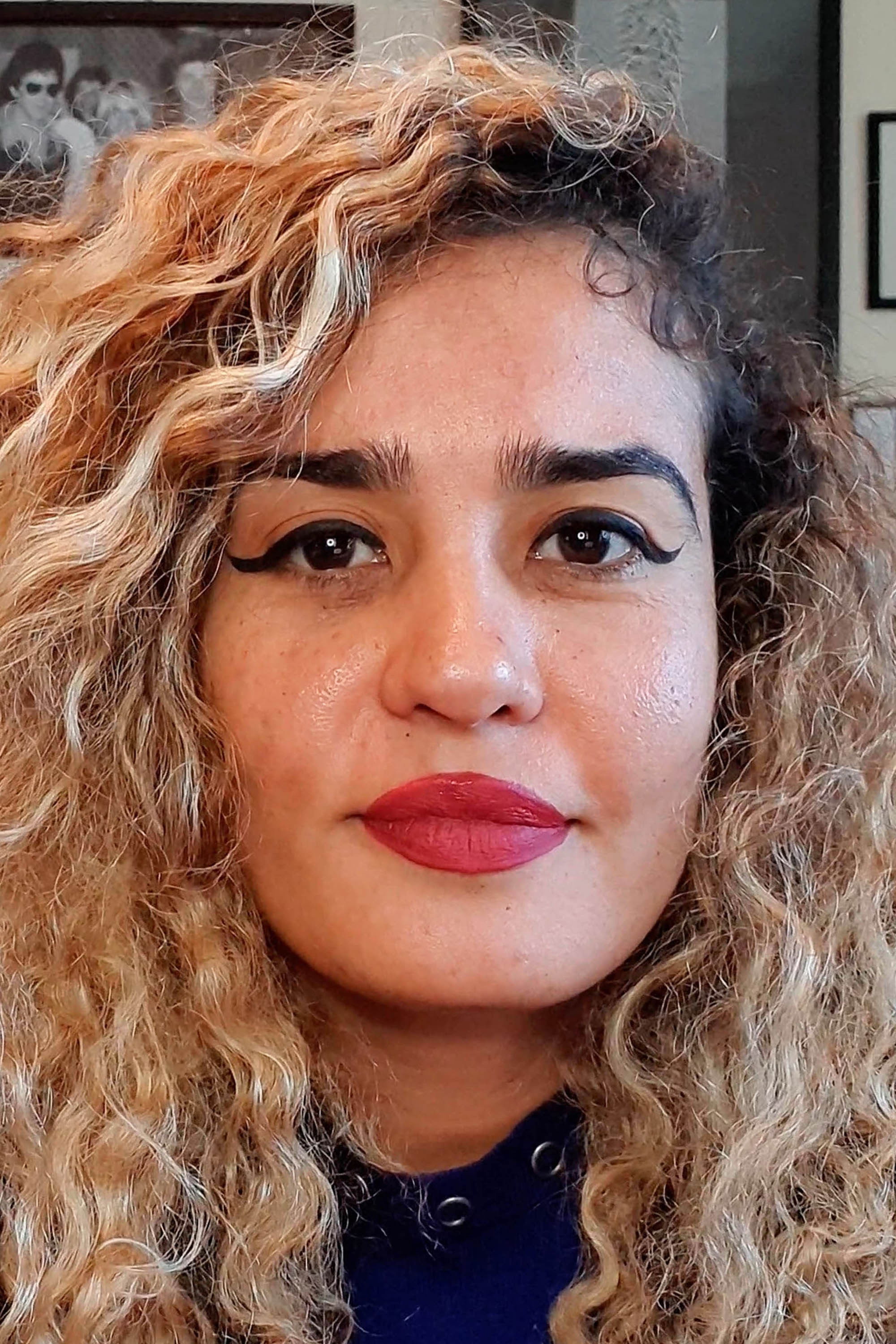 Suzannah Mirghani backdrop