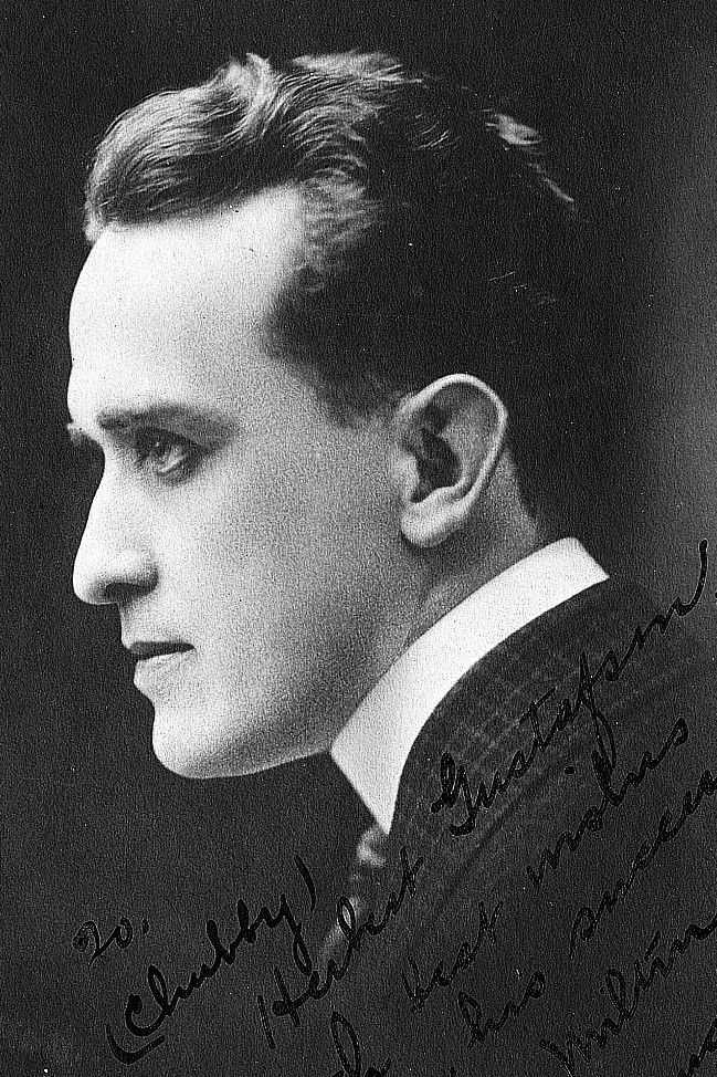 John A. Milton backdrop