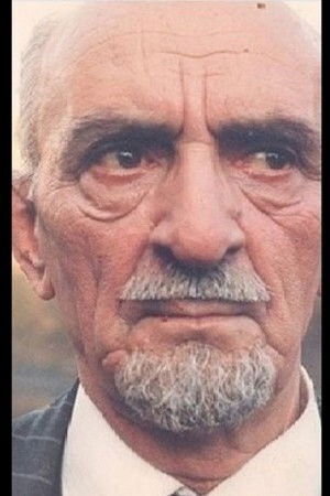 Gholamhossein Naghshineh backdrop