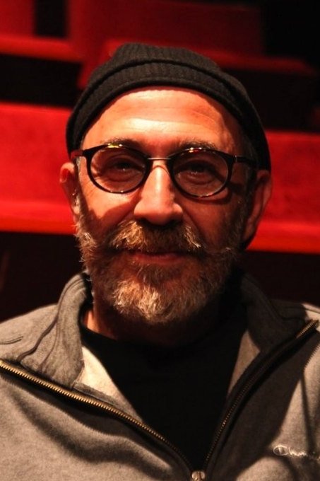 Mihail Giannikakis backdrop