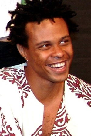 Gustavo Mello backdrop