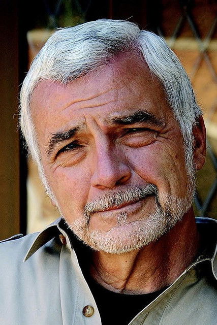 J.M. Adovasio backdrop