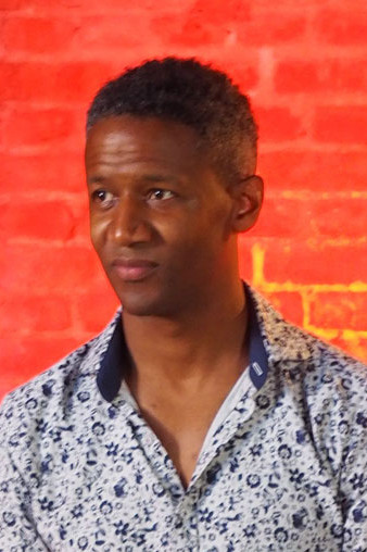 Irving Acao backdrop