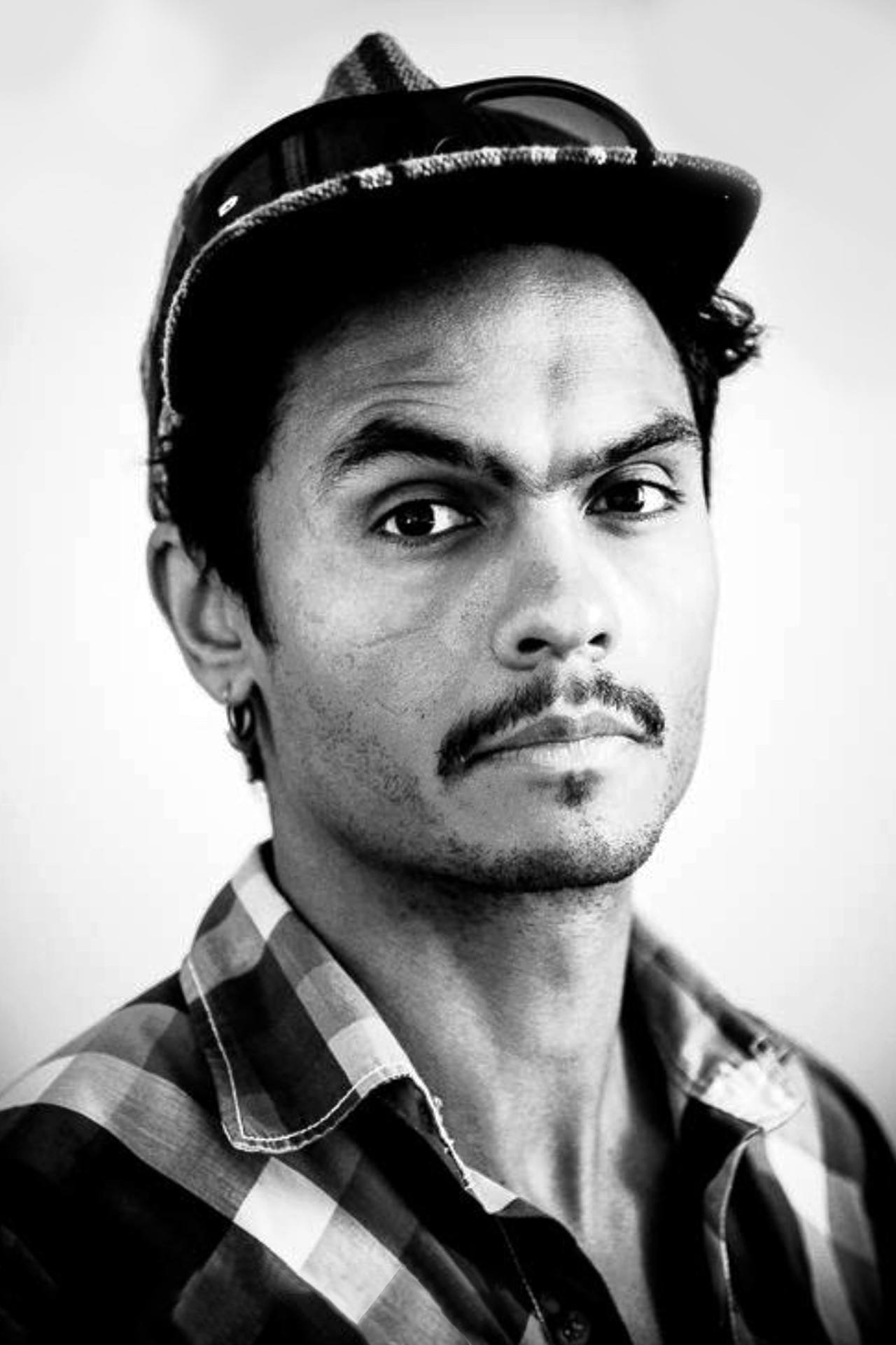 Saïd Belhaj backdrop