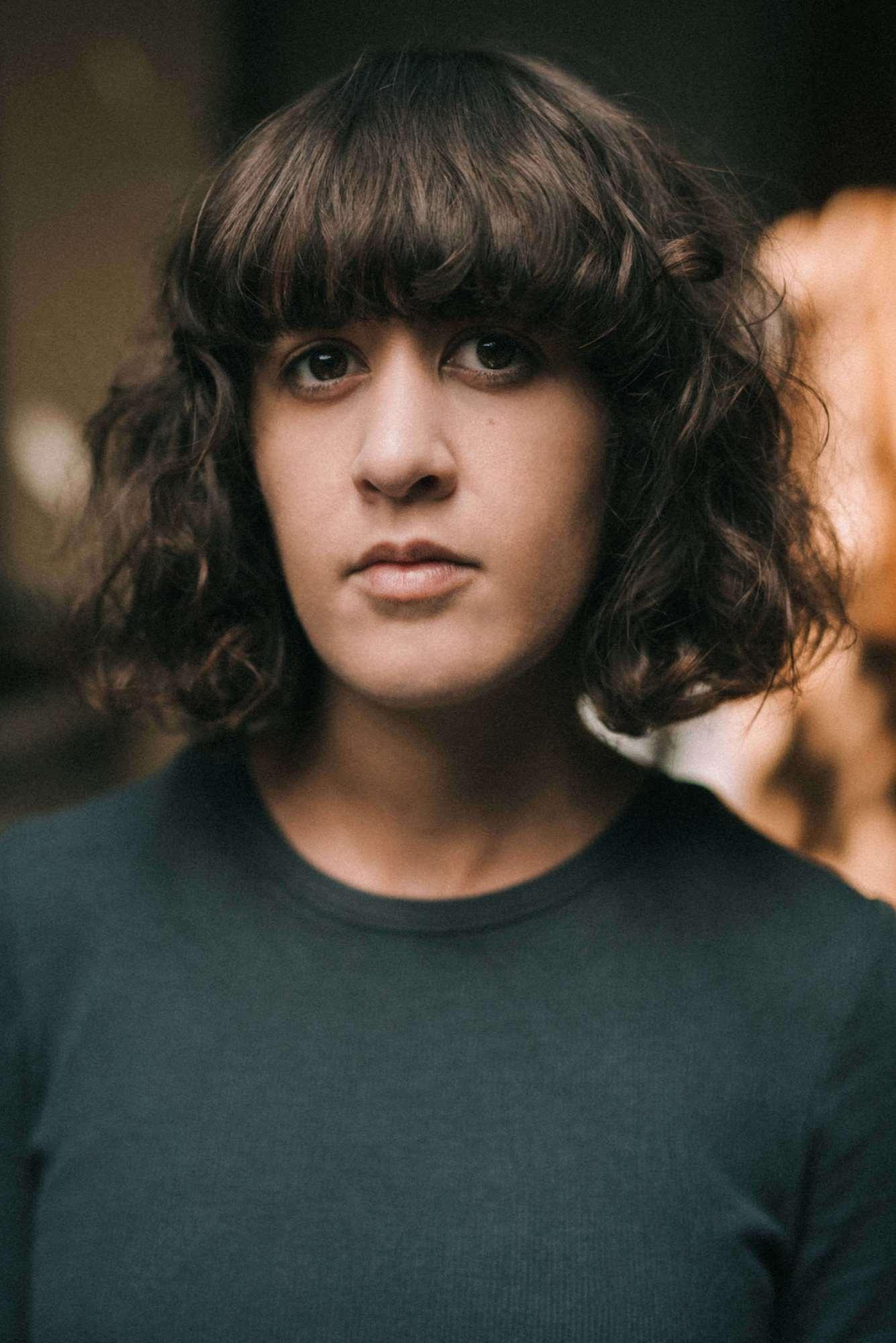 Naïla Guiguet backdrop