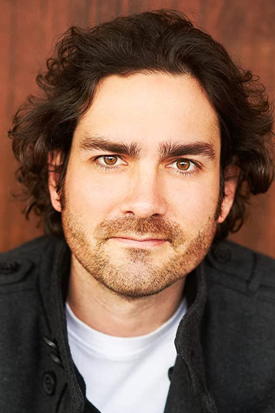 Paul David-Goddard backdrop