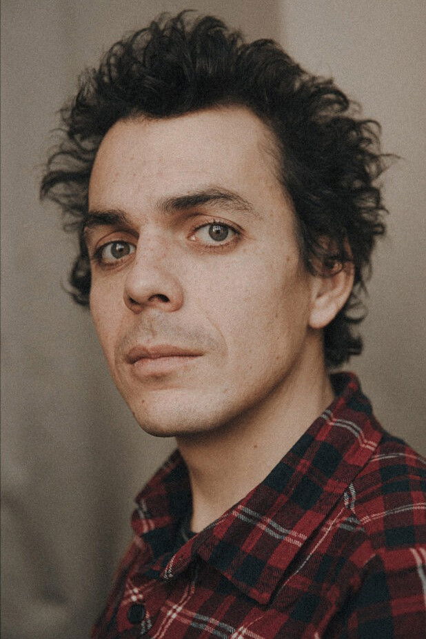 Carlos E. Lesmes backdrop