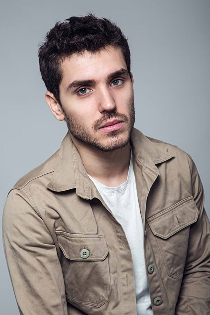 Emmanuel Berthelot backdrop