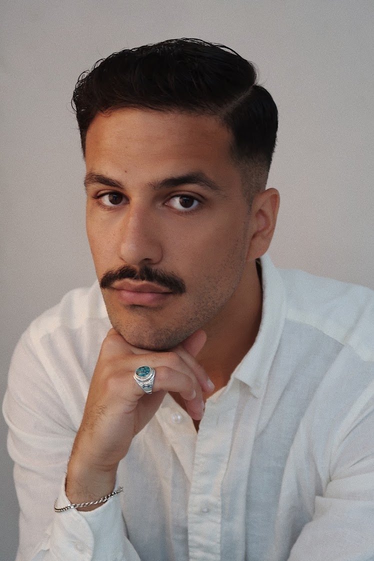 Mustafa Al-Mashhadani → Mustafë Al-Mashadani backdrop