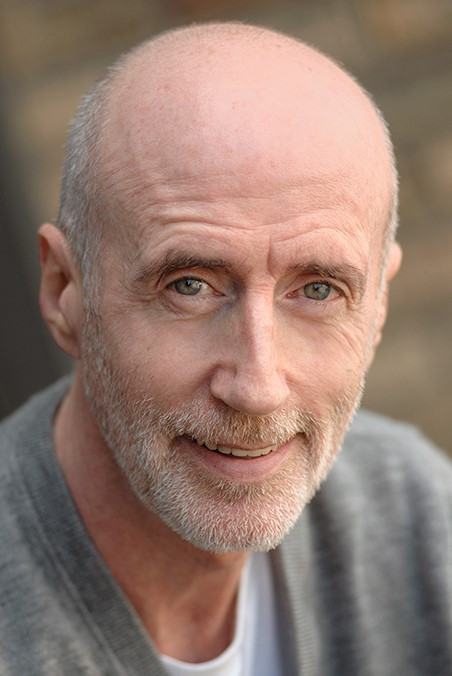 John B. McCann backdrop