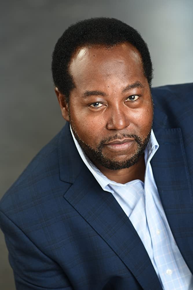 Milton Saul backdrop