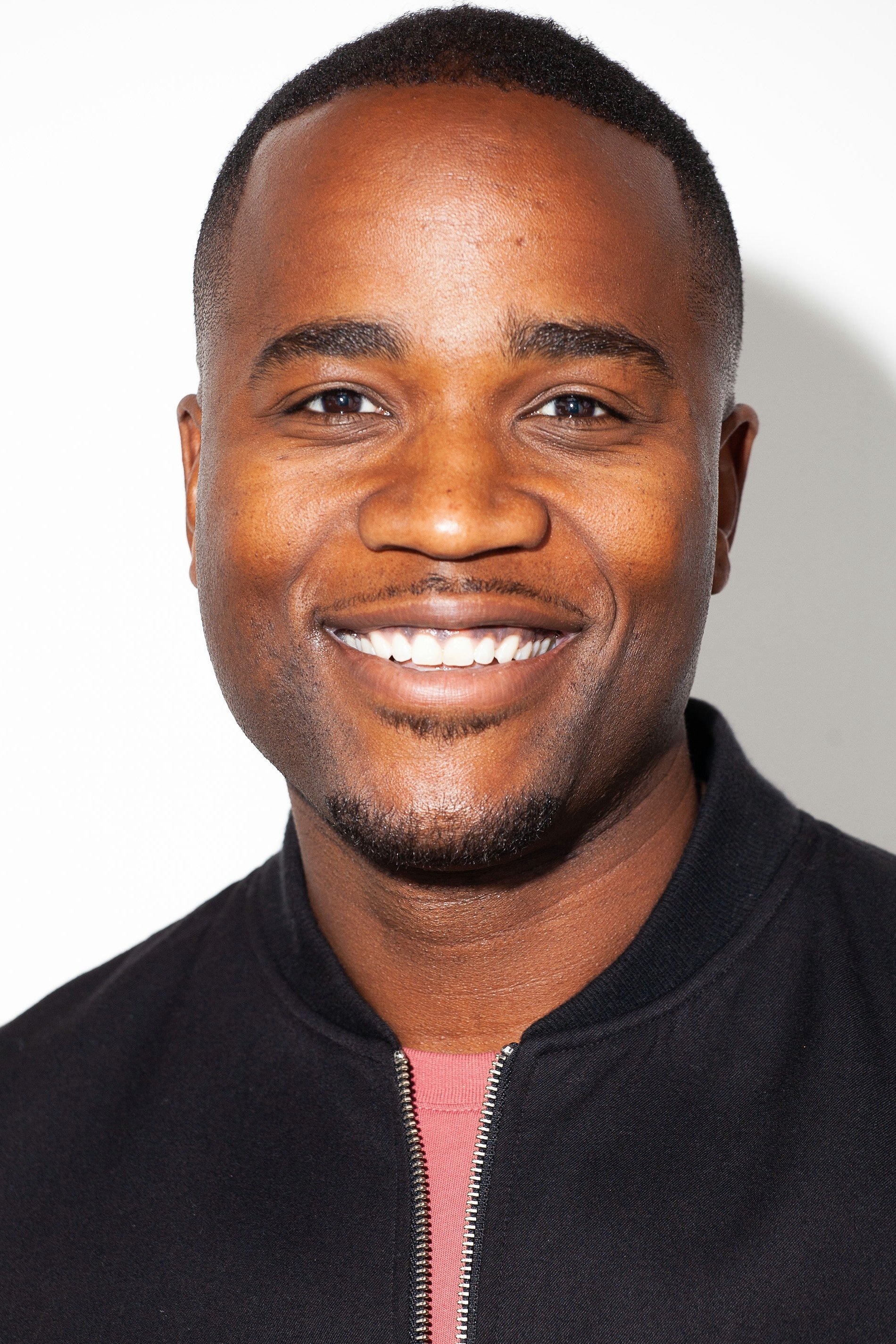 Abraham Amkpa backdrop