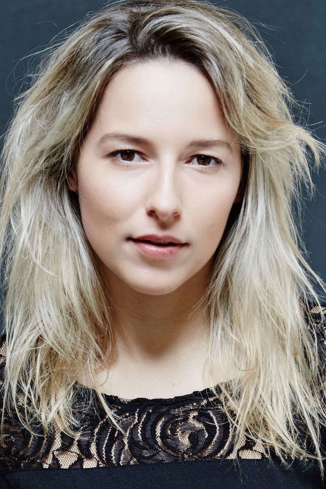 Mathilde Anglade backdrop