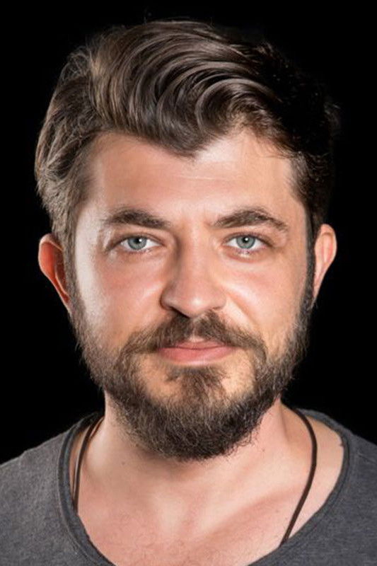 Tuna Kırlı backdrop