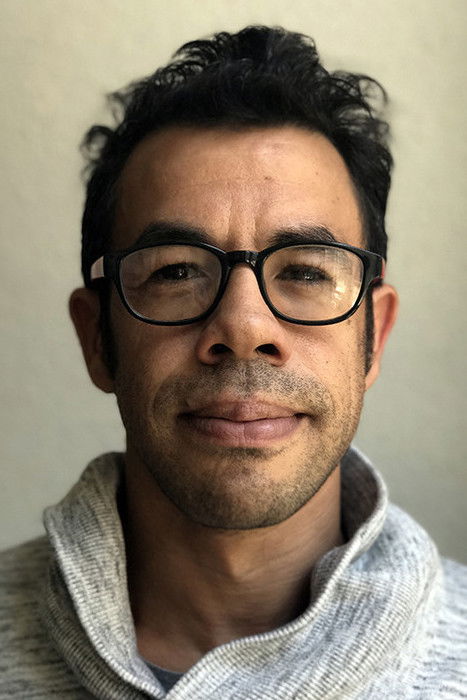 Driss Aroussi backdrop