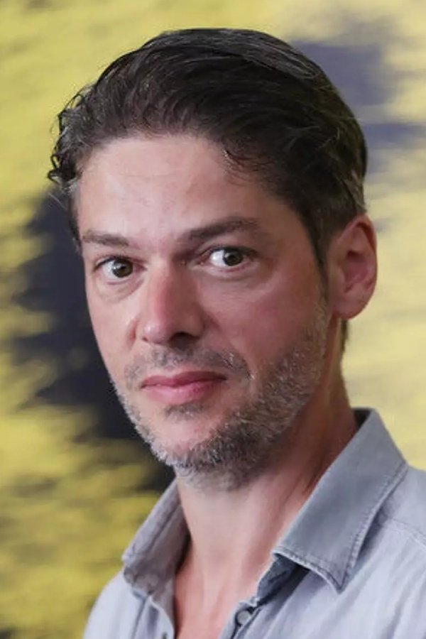 Samuel Xhuji backdrop