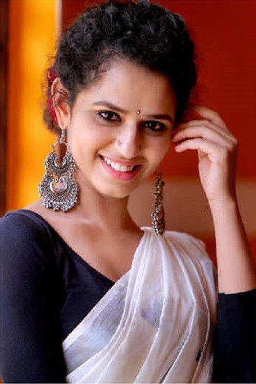 Meenakshi Raveendran backdrop