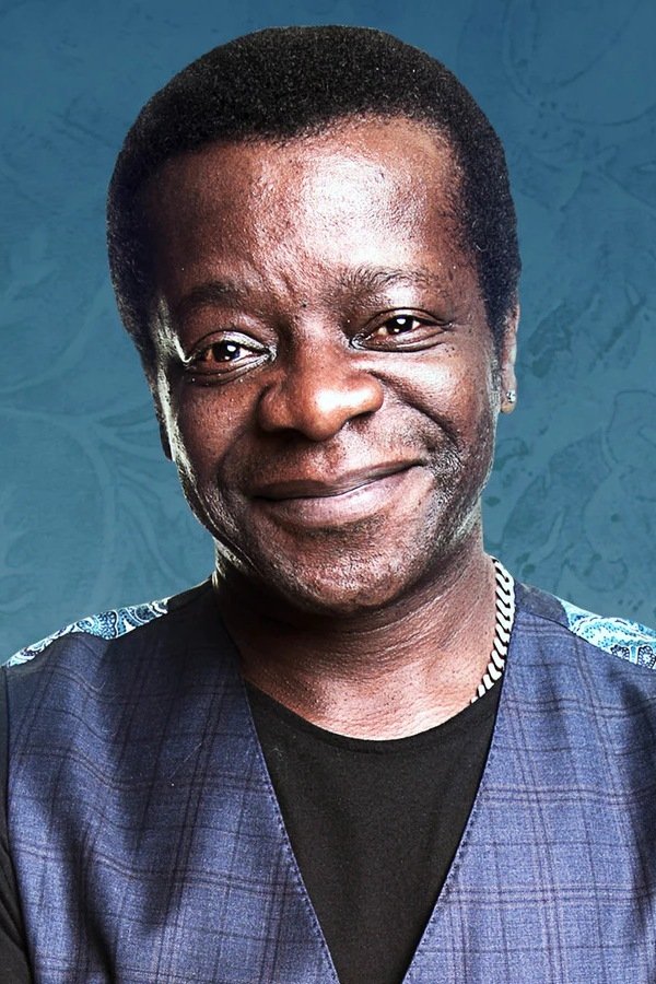 Stephen K. Amos backdrop