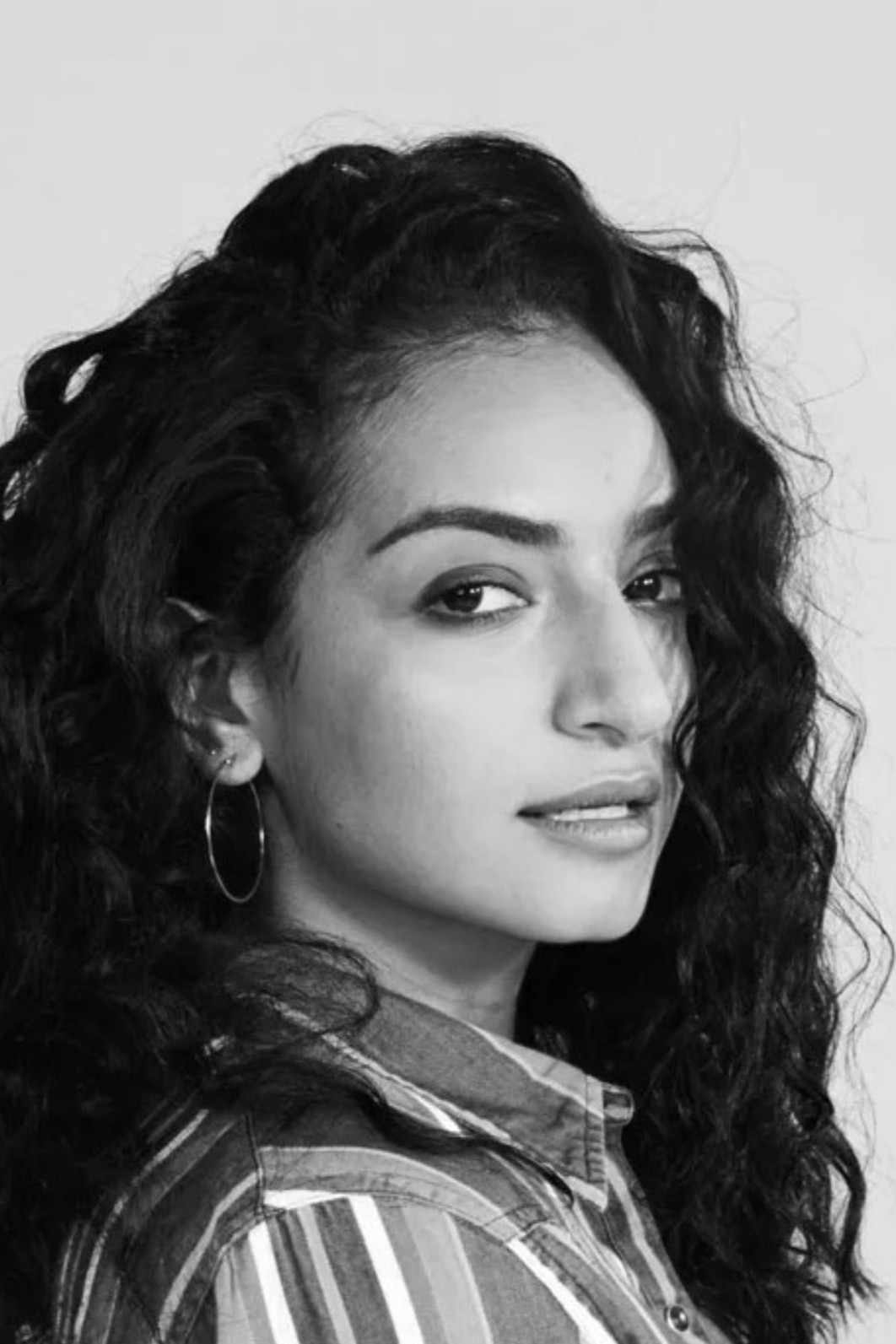 Yumna Al-Arashi backdrop