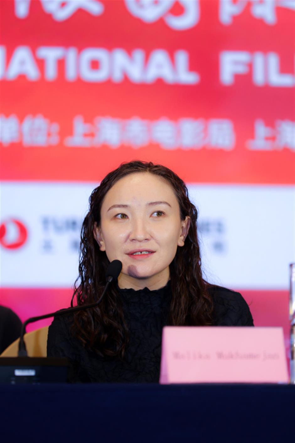 Malika Mukhamejan backdrop