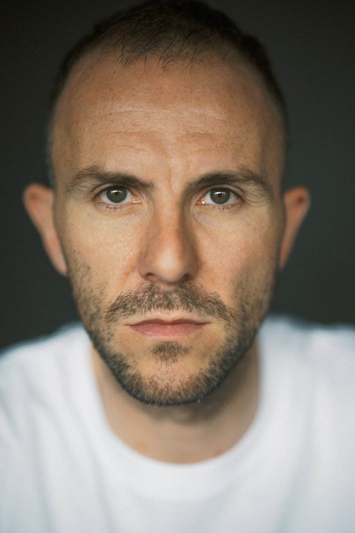 John Tueart backdrop