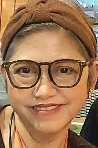 Gina Marissa Tagasa-Gil backdrop