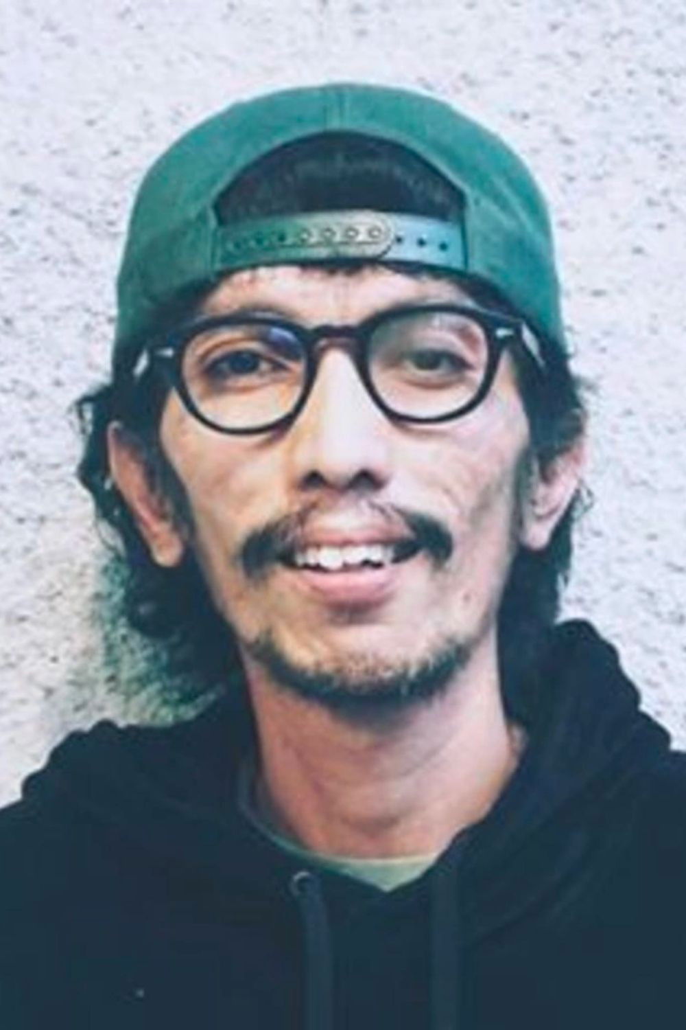 Charlie Meliala backdrop