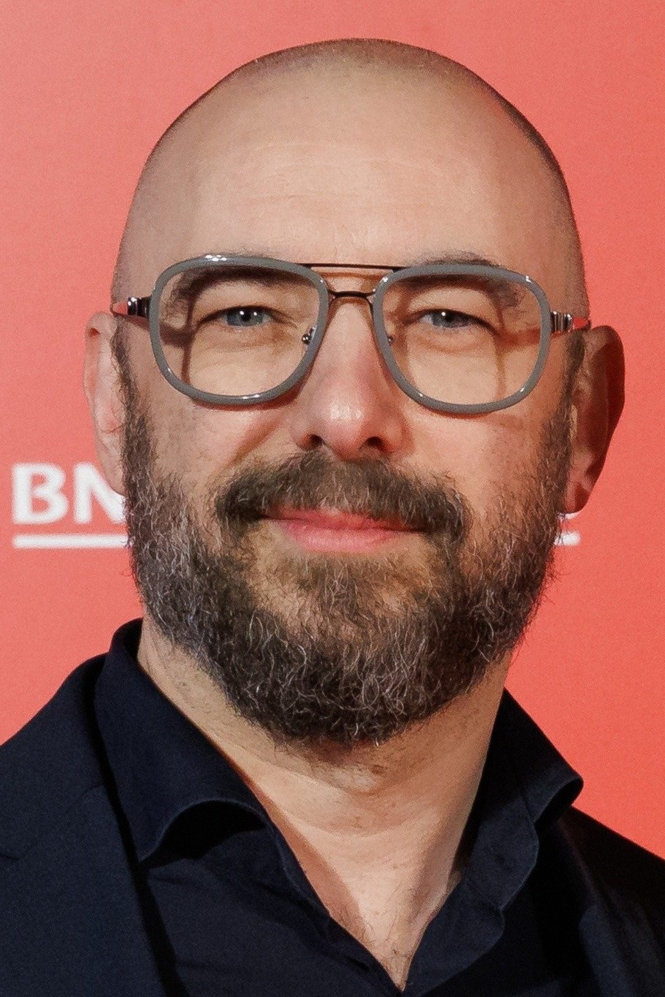 Michaël R. Roskam backdrop