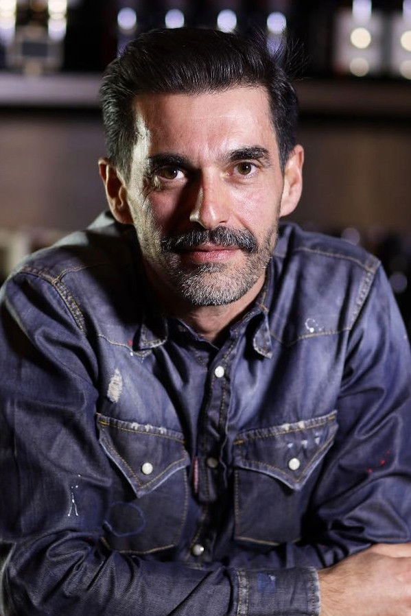 Donat Qosja backdrop