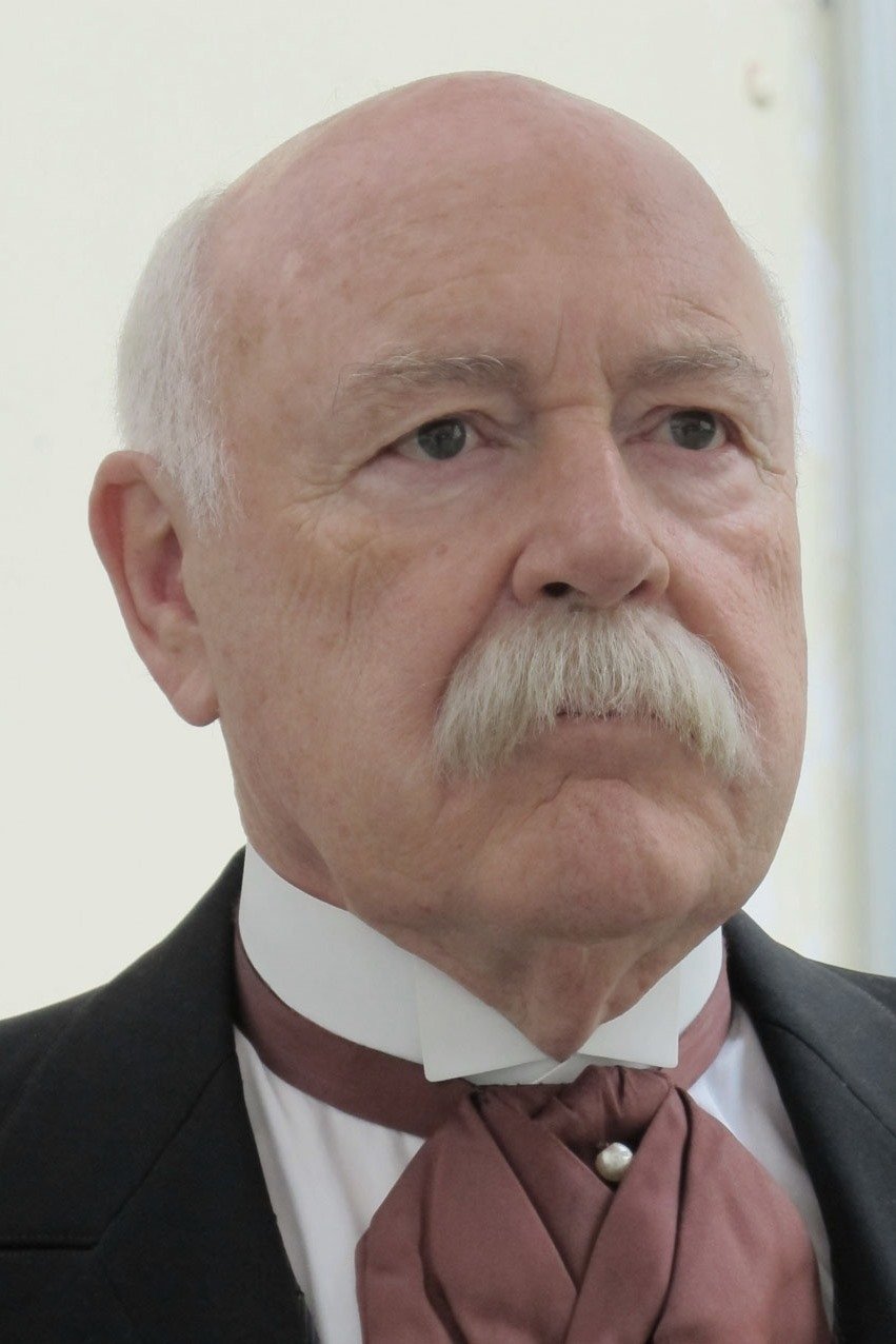 Eric P. Caspar backdrop